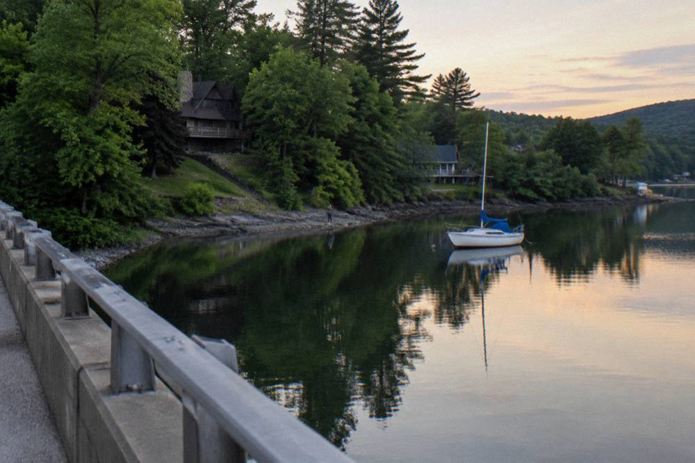 Calm cove at Deep Creek Lake with tree-lined banks and still water